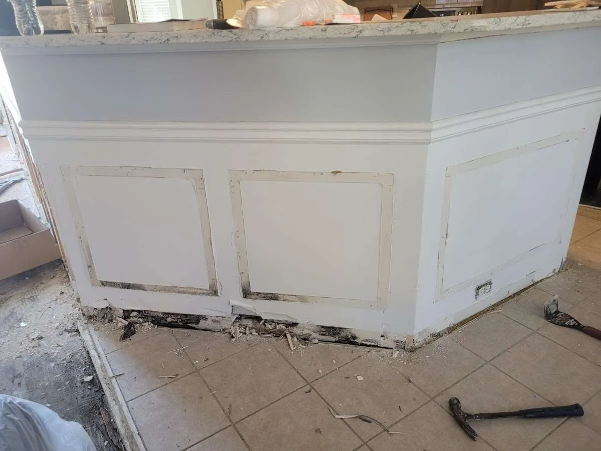 Water damage and mold on kitchen during Storm Damage Restoration in Lely Resort